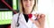 Doctor cardiologist therapist holds red heart