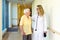 Doctor chatting to an elderly lady patient