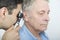 Doctor Checking Patient\'s Ear Using Otoscope