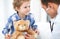 Doctor and child patient. Physician examines little boy by stethoscope. Medicine and children`s therapy concept