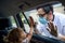 Doctor coming to see daughter in isolation, car window glass separating them.