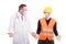 Doctor and constructor standing making questioning gesture