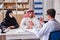 The doctor consulting arab family at hospital