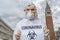 Doctor in coveralls warns of coronavirus infection in Venice in Italy.