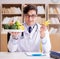 Doctor in dieting concept with fruits and vegetables