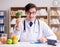 Doctor in dieting concept with fruits and vegetables