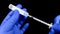 The doctor draws a medicine or substance for vaccination with an insulin syringe from a plastic ampoule. Macro video of medical eq