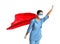 Doctor dressed as superhero posing on white background. Concept of medical workers fighting with COVID-19