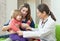 Doctor examining 2 years baby with stethoscope