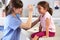 Doctor Examining Child\'s Eyes In Doctor\'s Office