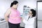 Doctor examining a patient obesity