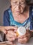 Doctor explains to elderly daily dose of medication