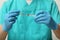 Doctor filling syringe with hepatitis vaccine from glass vial on grey background, closeup