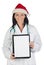 Doctor girl with with Santa Claus hat and clipboar