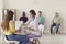 Doctor gives the patient documents to sign before giving her the Covid-19 antiviral vaccine.