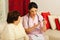 Doctor giving medicines to elderly woman