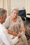 Doctor giving pills to his patient