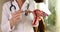 Doctor gynecologist holds anatomy of uterus with ovaries in clinic closeup