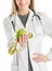 Doctor With Hand On Hip Showing Green Apple And Tape