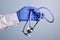Doctor Hand Holds Medical Stethoscope - Standard Medical Gadget