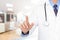 Doctor hand touching empty virtual screen