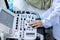 Doctor hand at ultrasound scanner control panel. Ultrasound machine Doctor hand use investigation. Doctor operating on a machine t