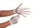Doctor hand in white latex sterile gloves with forceps isolated