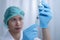 Doctor hands fill syringe with medicine vial on hands of a nurse,doctor preparing administer injection to the patient. medicine