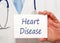 Doctor with Heart Disease sign
