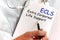 Doctor holding a card with text ECLS, medical concept