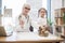 Doctor holding medicine bottle near pet and little girl