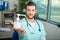 Doctor holding pump dispenser antibacterial handwash