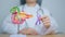 Doctor holding Purple ribbon with human Pancreas model for support Pancreatic cancer November awareness month, Pancreatitis,