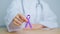 Doctor holding purple Ribbon for Violence, Pancreatic, Esophageal, Testicular cancer, Alzheimer, epilepsy, lupus, Sarcoidosis and