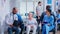 Doctor holding radiography of disabled senior woman in wheelchair