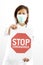 Doctor holding a stop coronavirus sign