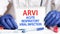 Doctor holding a tablet with text: ARIV. ARVI - Acute Respiratory Viral Infection, medical concept