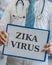 Doctor holds clipboard with ZIKA virus written