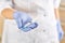 Doctor holds a medical syringe with medicine in the palm of his hand