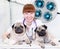 Doctor hugging two dogs in a veterinary clinic