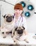 Doctor hugging two dogs in a veterinary clinic