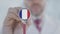 Doctor listening with the stethoscope with flag of France. French healthcare