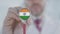 Doctor listening with the stethoscope with flag of India. Indian healthcare