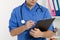 Doctor makes notes in the clinic close up. Doctor working in medical office