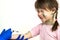 Doctor making vaccination injection to an afraid child girl sick with chickenpox, measles or rubella virus. Vaccination of