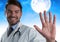 Doctor man touching air in front of moon