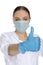 Doctor in mask and gloves with gesture OK