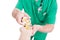 Doctor, medic or pharmacist pouring pills in patient hand