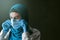 A doctor, a Muslim woman in a hijab and a protective medical bandage, was tired after taking a large number of patients as a