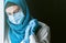 A doctor, a Muslim woman in a hijab and a protective medical bandage, was tired after taking a large number of patients as a